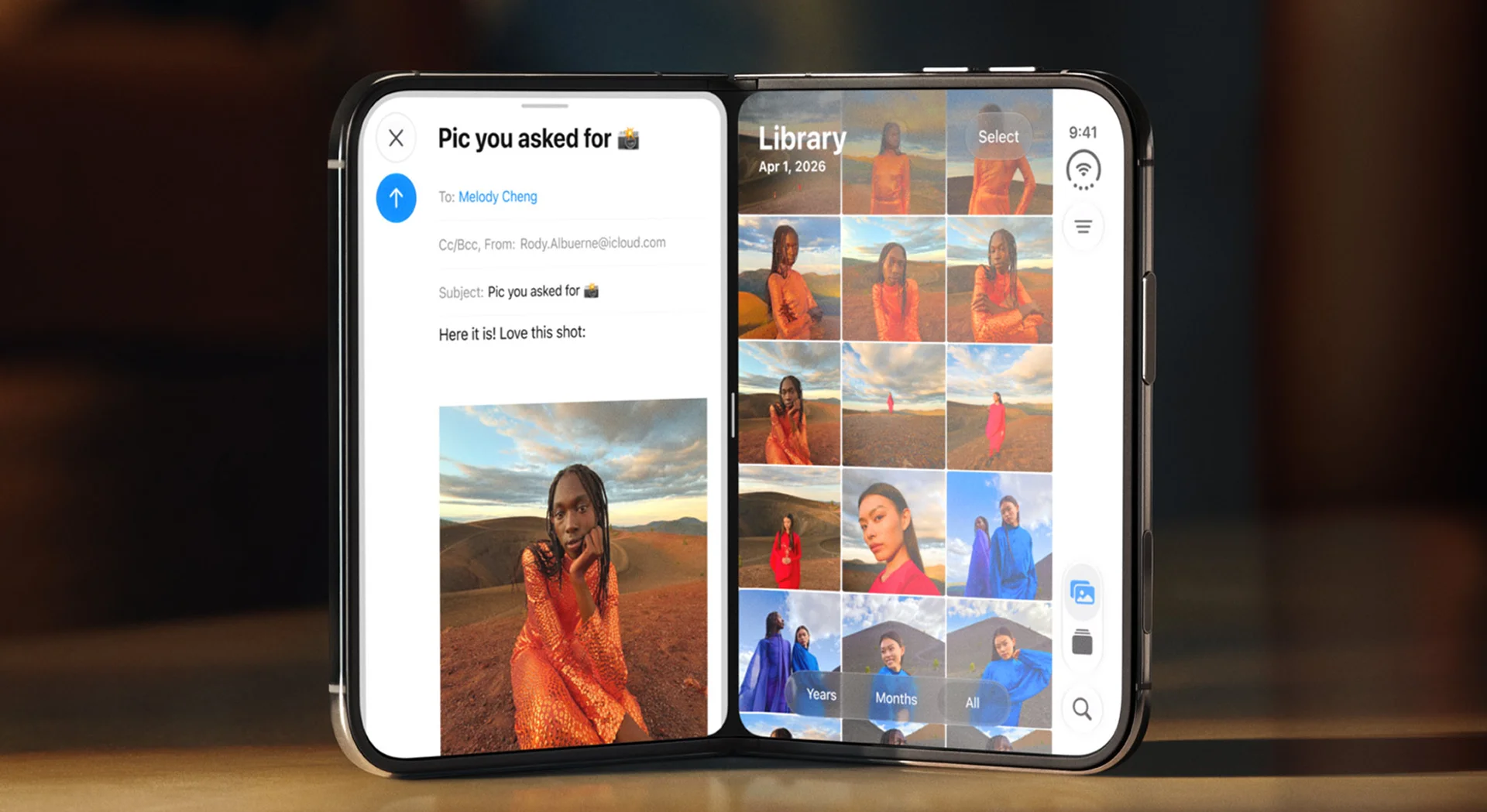 An unfolded iPhone Duo with an email on the left and the photo library on the right side of the inner display
