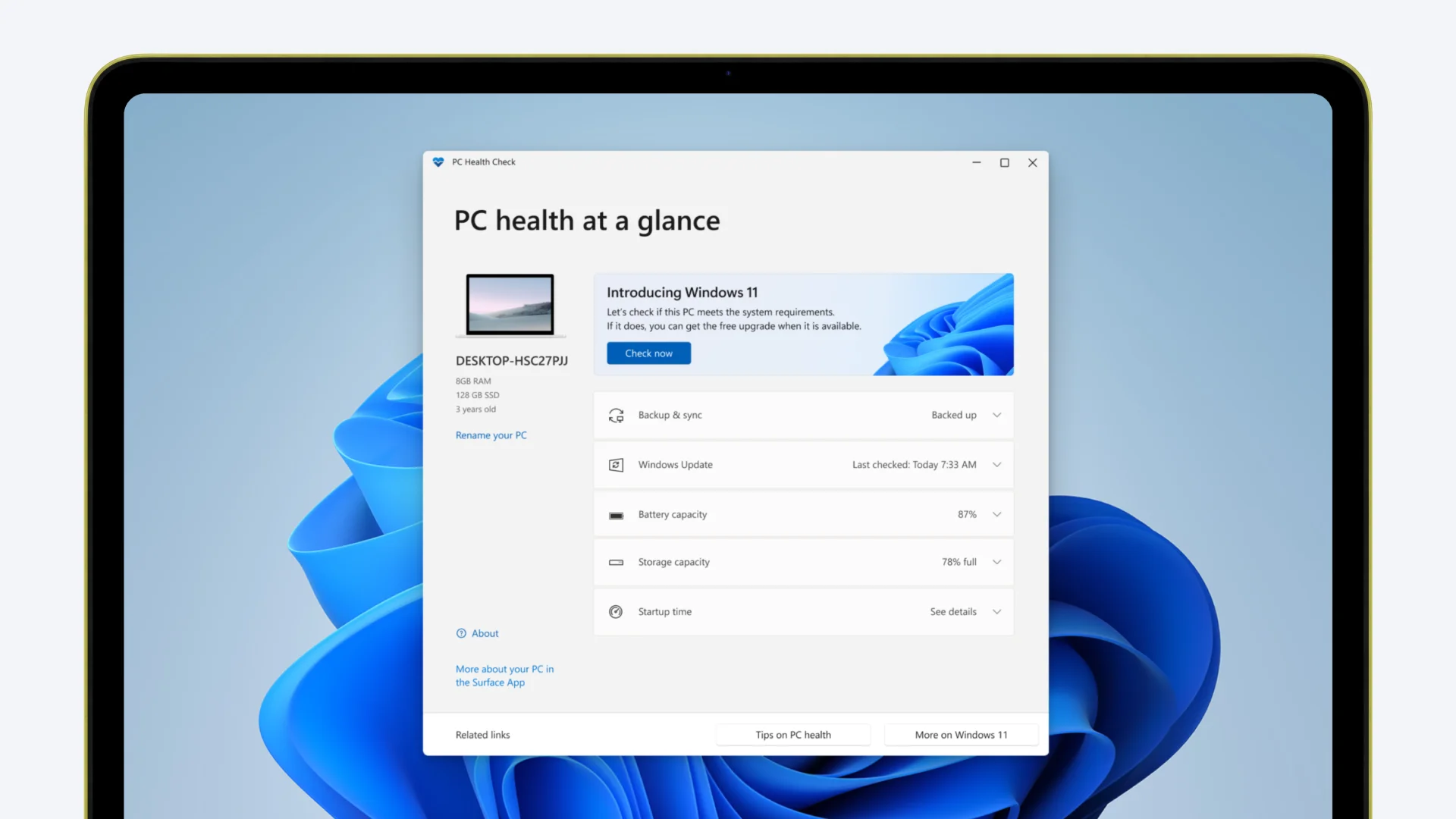 The PC Health Check app on a laptop screen, showing a button to check the computer’s compatibility with Windows 11